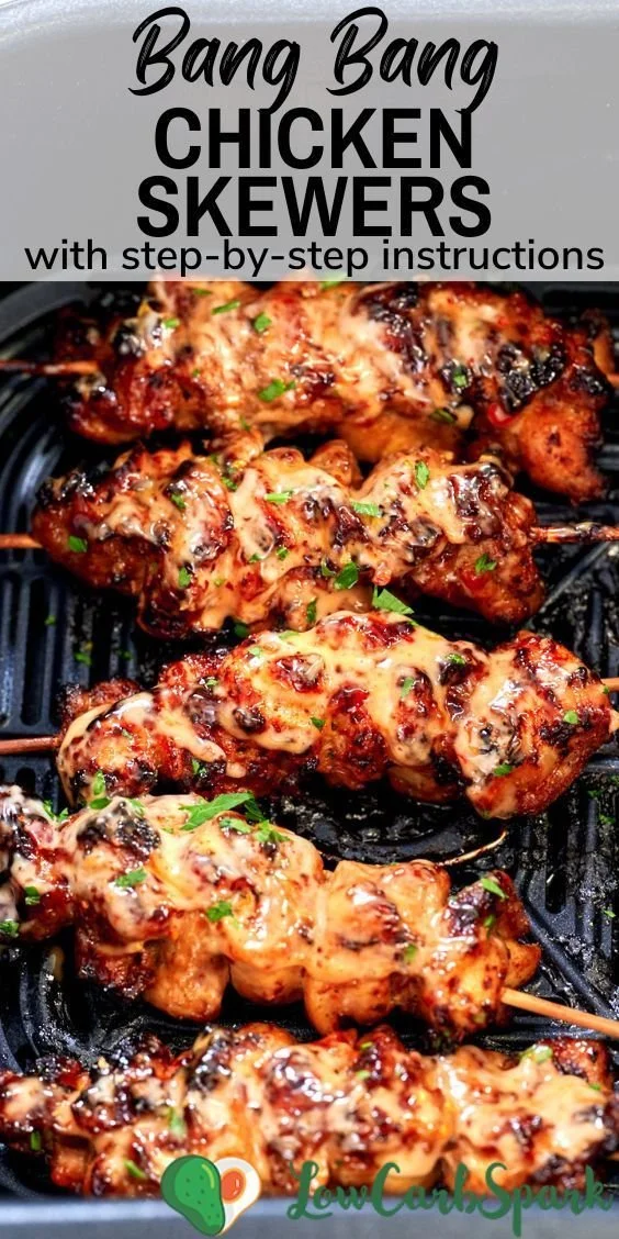 Air Fryer Bang Bang Chicken Skewers served on a plate with dipping sauce