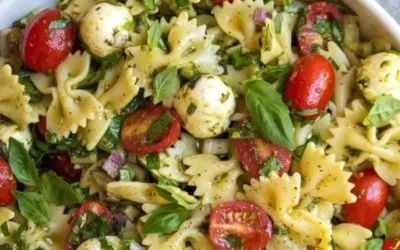 Delicious Bow Tie Pasta Salad with colorful vegetables and dressing