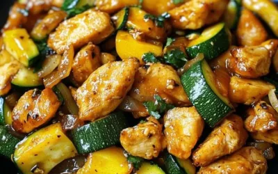 Delicious chicken zucchini stir fry served in a bowl with vibrant vegetables.