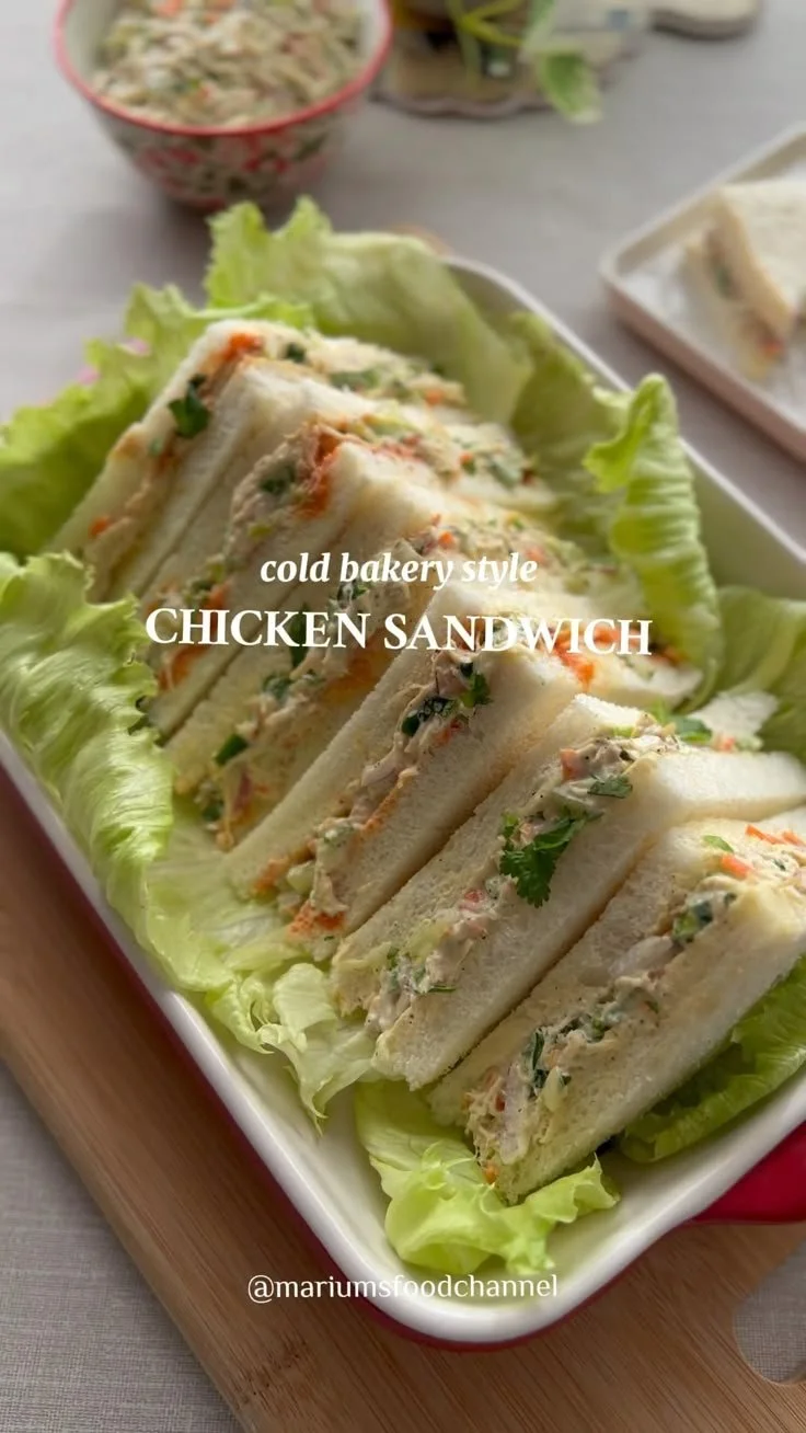 Cold chicken mayo sandwich served on fresh bread with lettuce and tomato