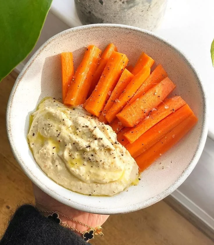 Healthy snacks made with carrots, lemon, and salt from Deliciously Ella
