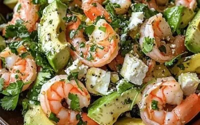 Bowl of exotic avocado salad with colorful vegetables and dressing