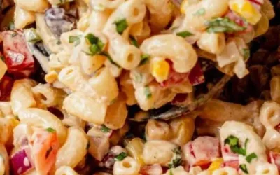 Bowl of colorful Mexican Macaroni Salad with vegetables and dressing