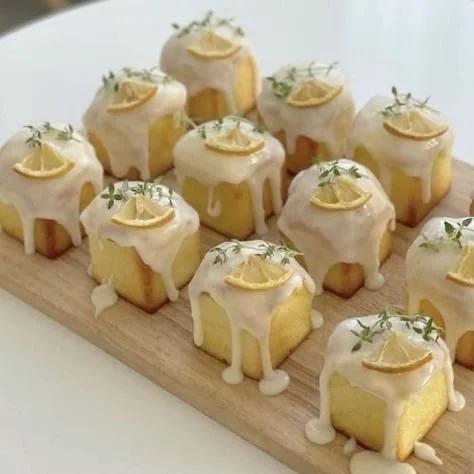 Mini lemon loaves topped with icing for a delicious citrus dessert