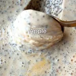 Delicious overnight apple chia pudding topped with fresh apple slices