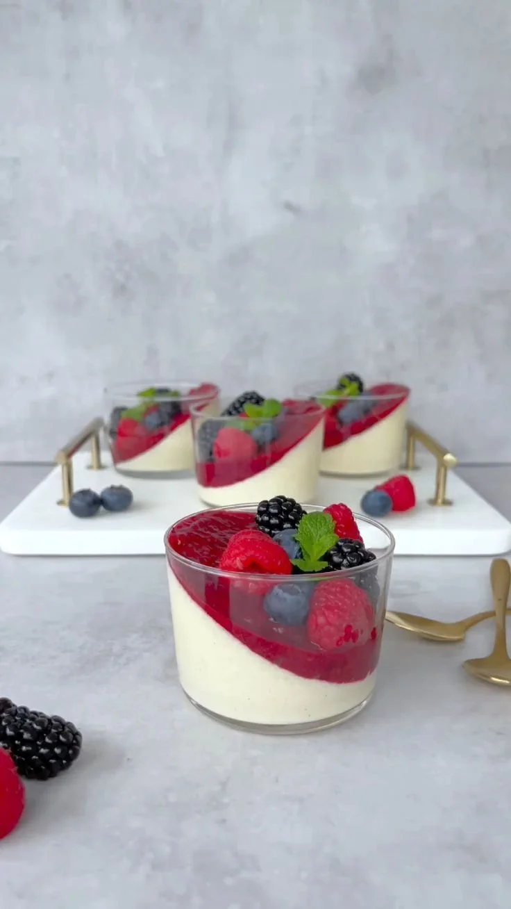 Delicious panna cotta dessert elegantly served with fresh berries.