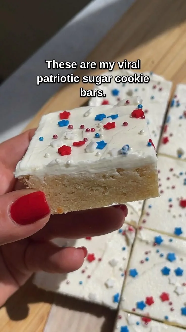 Delicious patriotic sugar cookie bars decorated with red, white, and blue frosting