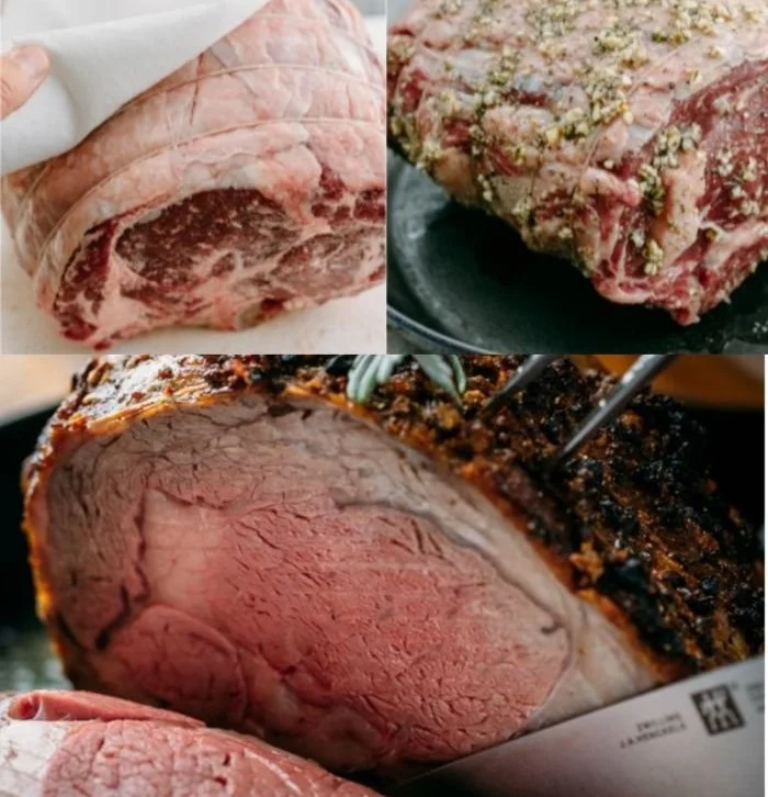 Deliciously cooked prime rib served with sides and herbs.