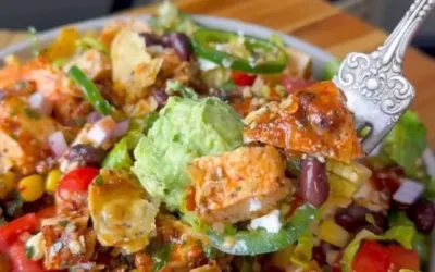 Colorful Santa Fe Salad with fresh vegetables, beans, and dressing