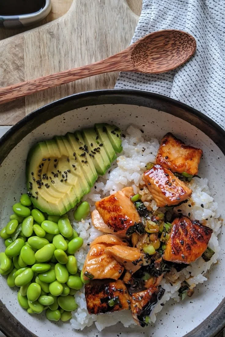 Delicious Sticky Gluten-Free Teriyaki Salmon Sushi Bowl with fresh ingredients.