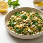 Close-up of the finished Jennifer Aniston salad with fresh herbs and feta